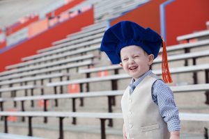 kid with graduation cap