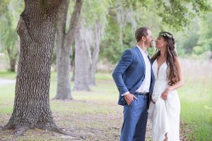 wedding couple under tree