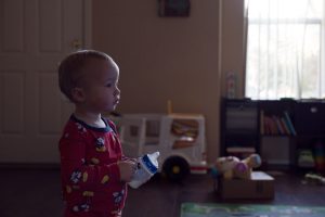 baby in front of window