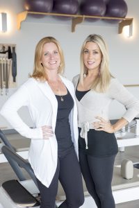 portrait of pilates studio owners