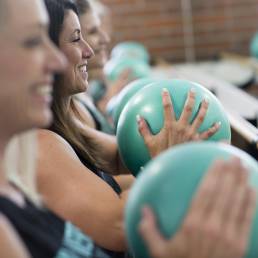 barre fitness instructor during class